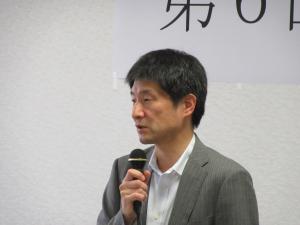主催者東北地方整備局　山田道路部長の挨拶の写真です。